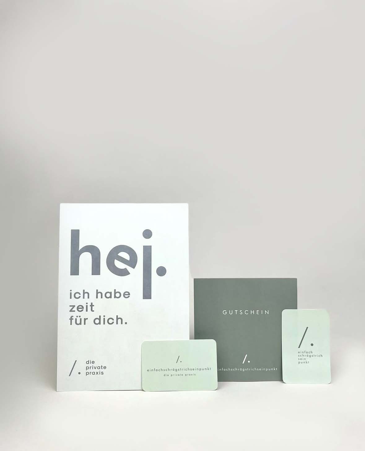 A collection of stationery, including a greeting card and gift vouchers