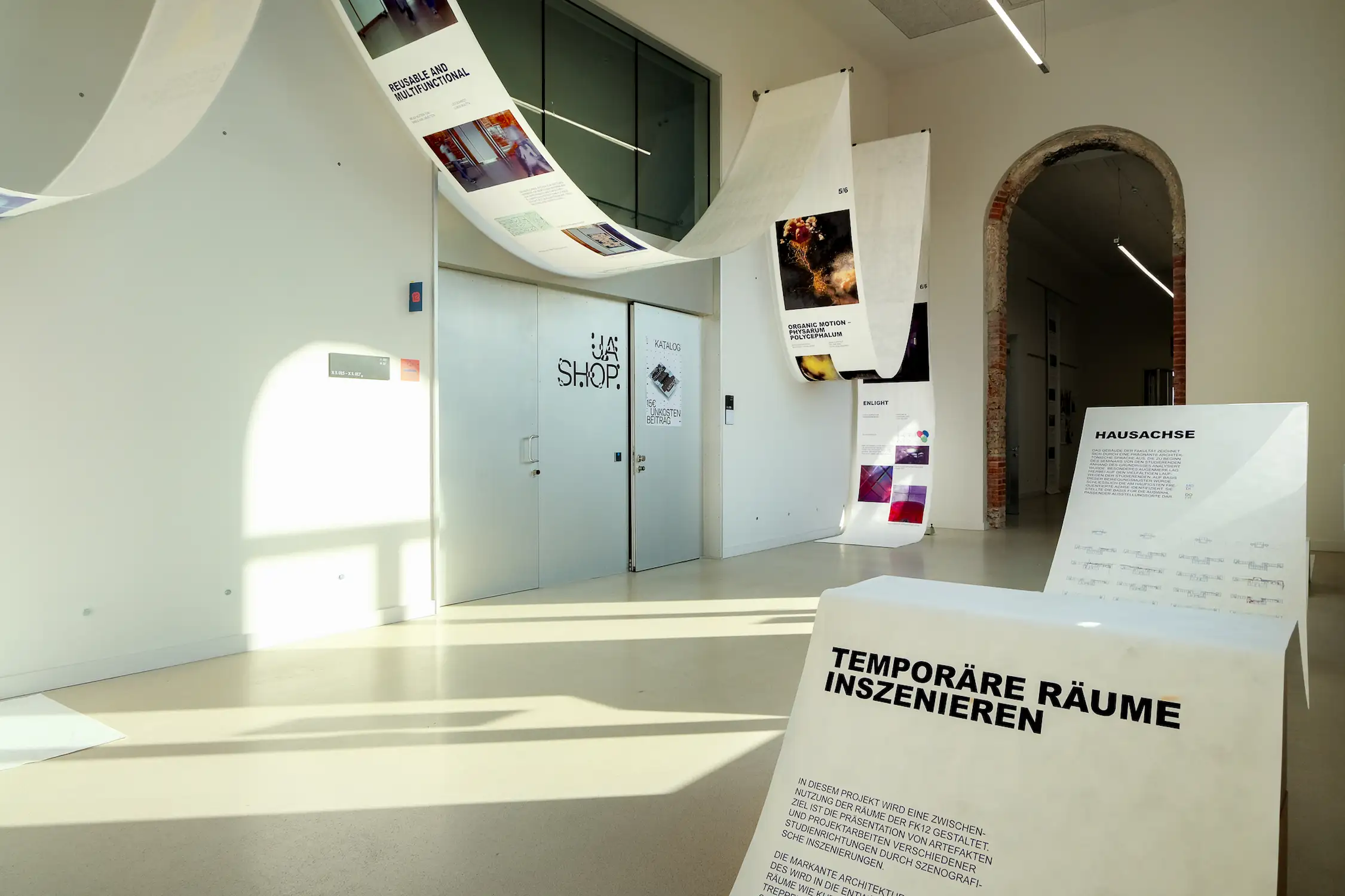 a girl is holding a modular pole system made out of steel