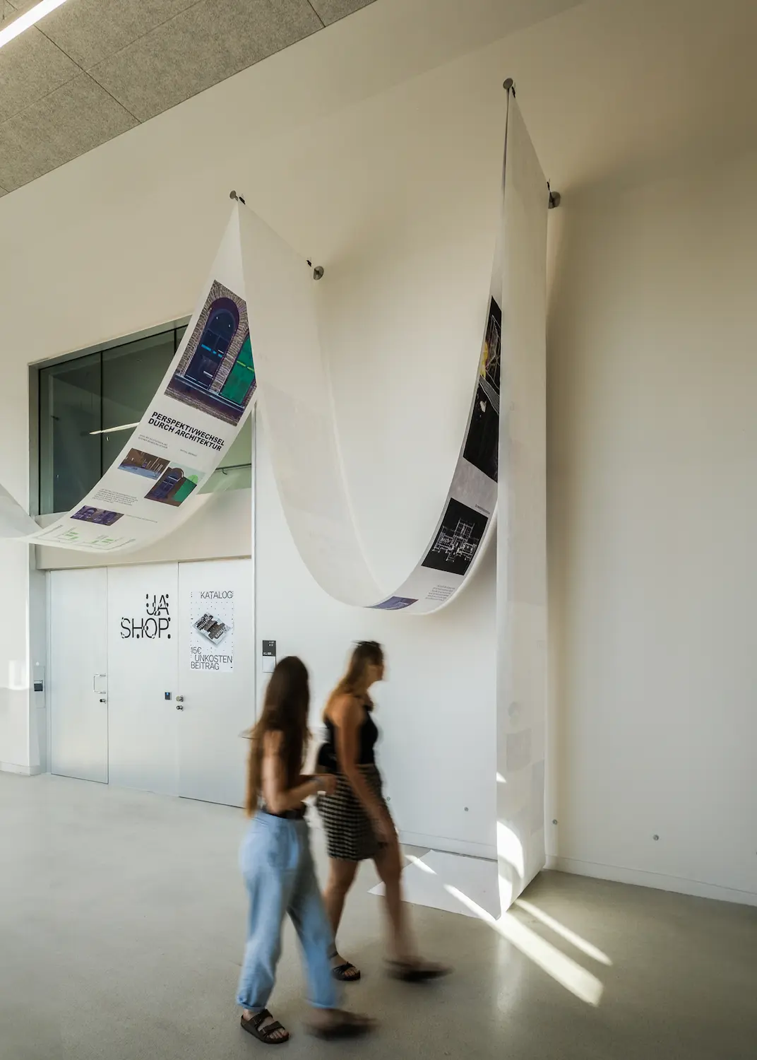 different formats of the poster with a black and with photograpy of a girl on it.